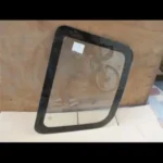 KOMATSU PC300-7 marco de cristal trasero izquierdo