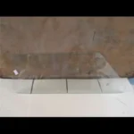 KOMATSU PC60-5 marco de cristal trasero izquierdo